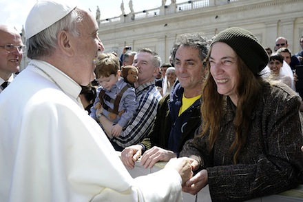 Pope Francis greets U.S. singer Patti Smith during weekly audience at Vatican